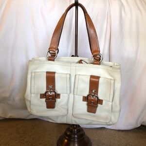 Well-loved white Coach tote and wallet
